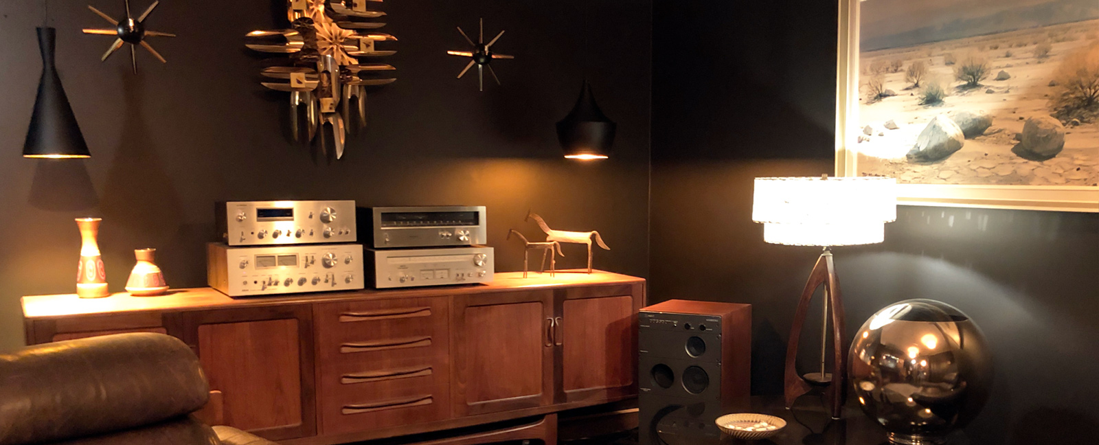 retro amplifiers and side table in funhouse reception lounge